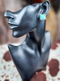 blue dice earring on mannequin 