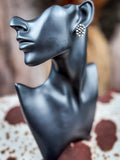 stud earring on mannequin 