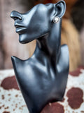 stud earring on mannequin