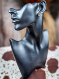 stud earring on mannequin