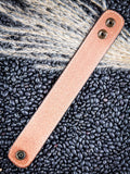 back of bracelet on beans and wheat