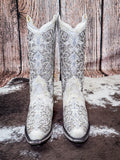 boots on cow hide, wood backdrop