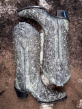 boots on cowhide