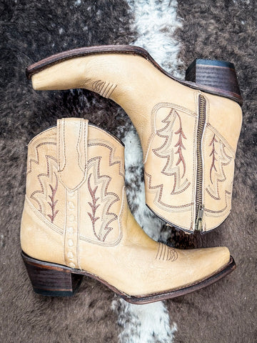 boots on cowhide