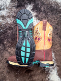 boots on cowhide