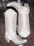Boots displayed on cowhide.