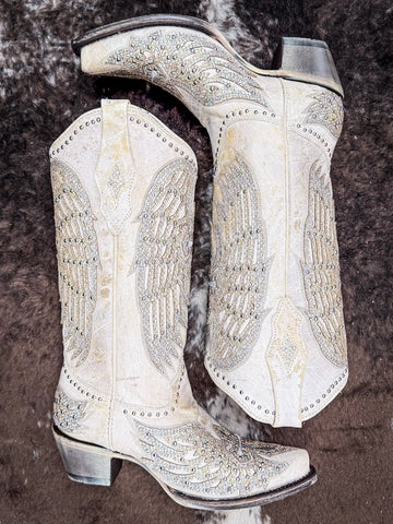 Boots displayed on cowhide.