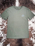 Front of Desert Dillo Hooey T-Shirt displayed on cow hide.