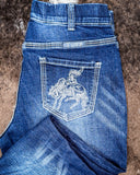 Bucking horse design on the back pockets of the Cowgirl Tuff Pull-On Buck Off Trouser.