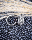 Twist and Timber Fashion Hoop Earrings displayed on beans and wheat.
