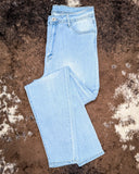 The High Noon Skinny Jeans displayed on cowhide.