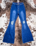 Front view of the Shannon Flare Jeans displayed on cowhide.