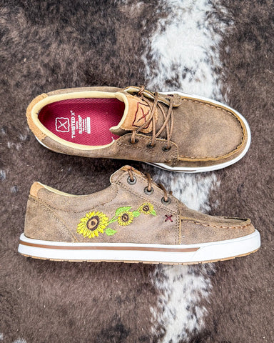 The Goldenroot Twisted X Kicks displayed on cowhide.