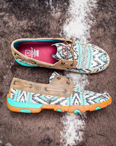 The Trailblazer Twisted X Boat Shoe Driving Moc displayed on cowhide.