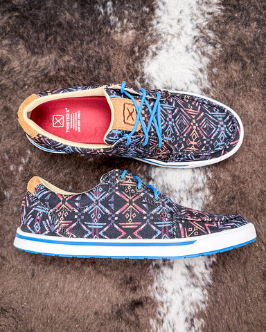 The Neon Mesa Twisted X Kicks displayed on cowhide.