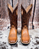 Front view of the Sienna Twisted X Women's 11" Ruff Stock Boot displayed on cowhide, wood backdrop.