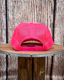 Back view of the Embroidered Rope Howdy Trucker Cap displayed on a wood table, wood backdrop.