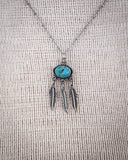Zoom in if the Abey Genuine Turquoise Necklace displayed on a mannequin.