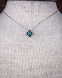Zoom in of the Catalina Genuine Turquoise Necklace on a mannequin.