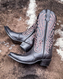 The Ironclad Rodeo Circle G Boots displayed on cowhide.