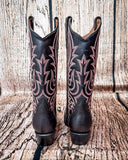 Back view of the Ironclad Rodeo Circle G Boots in a wood backdrop.