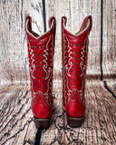 Back view of the Ironclad Rodeo Corral Boots in a wood backdrop.