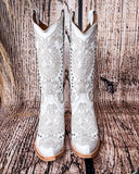 Front view of the Saddlebrush Rose Circle G Boots in a wood background.