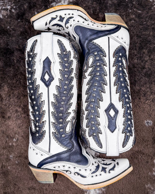 The Phantom Mesa Corral Boots displayed on cowhide.