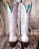 Back view of the Dust Rose Canyon Corral Boots with a wood backdrop.