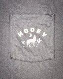 Zoom in of the pocket on the Coyote Hooey T-Shirt, showing graphic design.