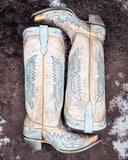 The Skyward Spirit Corral Boots displayed on cowhide.