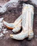 The Skyward Spirit Corral Boots displayed on cowhide.