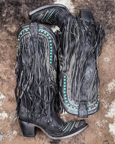 The Blackridge Stampede Corral Boots displayed on cowhide.