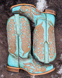 The Honey Dust Trailblazer Corral Boots displayed on cowhide.