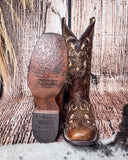 Front and bottom of the Desert Blossom Corral Boots in a wood backdrop,
