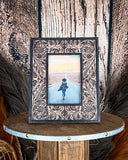Front view of the Myra Bag - Wyburn Canyon Photo Frame on a wood background.