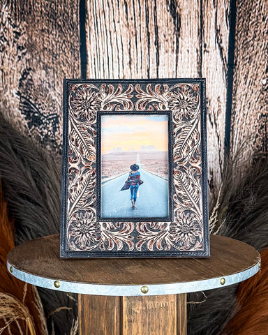 Front view of the Myra Bag - Wyburn Canyon Photo Frame on a wood background.