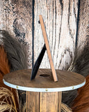 Side view of the Myra Bag - Wyburn Canyon Photo Frame on a wood background.