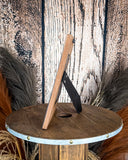 Side view of the Myra Bag - Wyburn Canyon Photo Frame on a wood background.