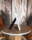 Side view of the Myra Bag - Tumbleweed Trail Photo Frame in Black and White on a wood background.