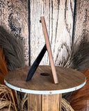 Side view of the Myra Bag - Mesa Plateau Photo FramePhoto Frame on a wood background.