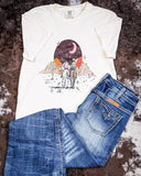 Styled flat lay of the Vintage Western Boho Graphic Tee with Cowgirl Tuff Jeans.