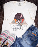 Styled flat lay of the Vintage Western Boho Graphic Tee with Twisted X shoes and Cowgirl Tuff Jeans.