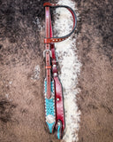 Side view of The Turquoise Wash Bull Coin Single Ear Headstall displayed on cowhide.