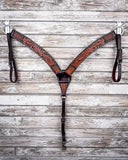 Floral and Sunflower Tooled Breast Collar displayed on a wood background.