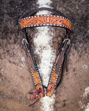 Floral and Sunflower Tooled Headstall displayed on cowhide.