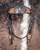 Signature Western Headstall displayed on cowhide.