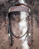 Crystal Collection Browband Headstall displayed on cowhide.