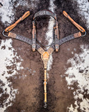 Crystal Collection Breast Collar and Browband Headstall displayed on cowhide.