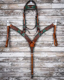 Painted Cactus Breast Collar and Browband Headstall displayed on a wood background.